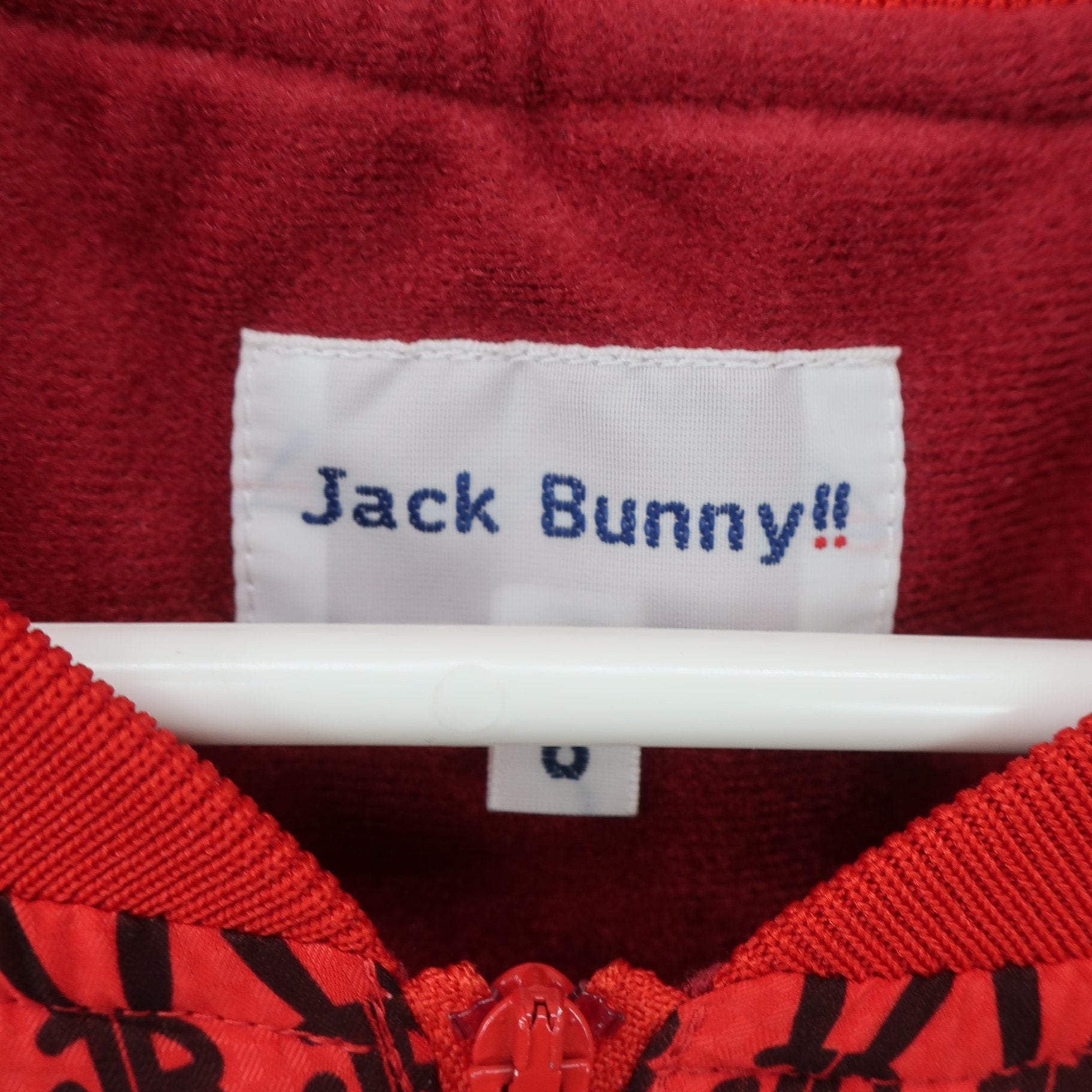 Jack Bunny(ジャックバニー) ハーフジップスニード 赤黒ロゴ柄 メンズ 6 262-0221001 A