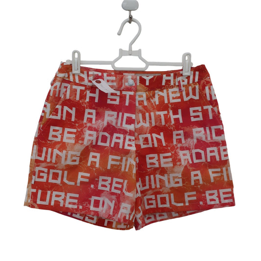 adabat1 ショートパンツ オレンジ系総柄 レディース 38 N