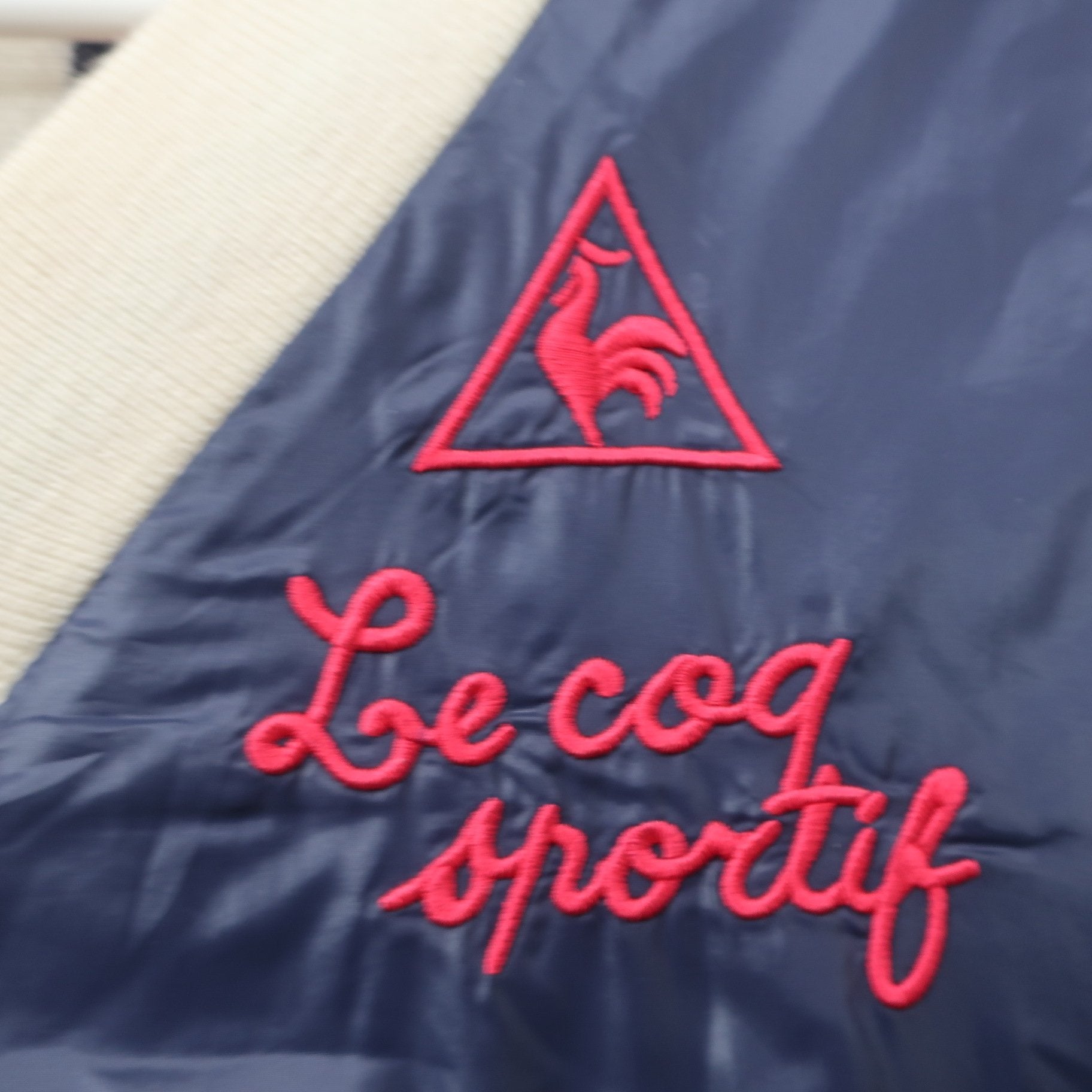 le coq sportif(ルコックスポルティフ) リバーシブルスニード ネイビー / 白ピンクネイビーストライプ メンズ LL B