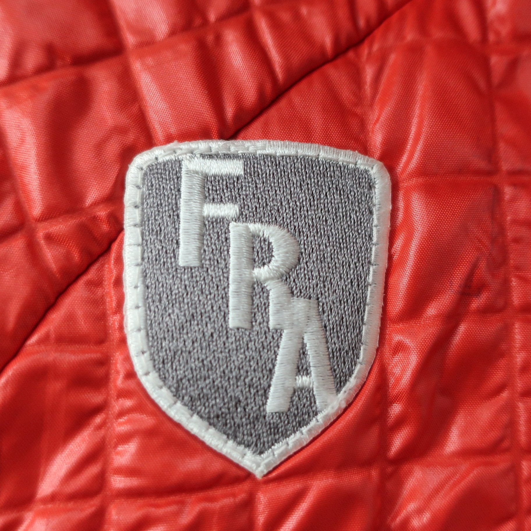 le coq sportif(ルコックスポルティフ) ナイロンパーカー 赤 レディース M B