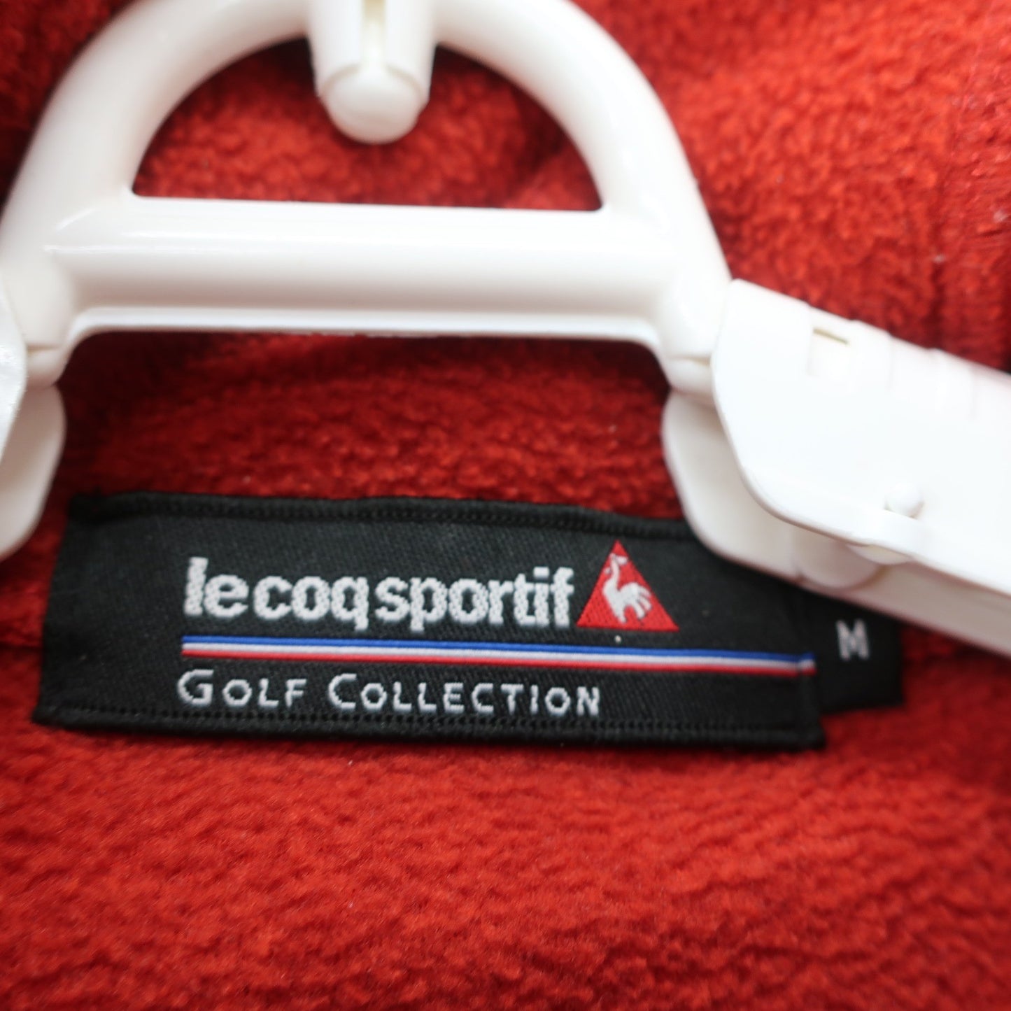 le coq sportif(ルコックスポルティフ) ナイロンパーカー 赤 レディース M B