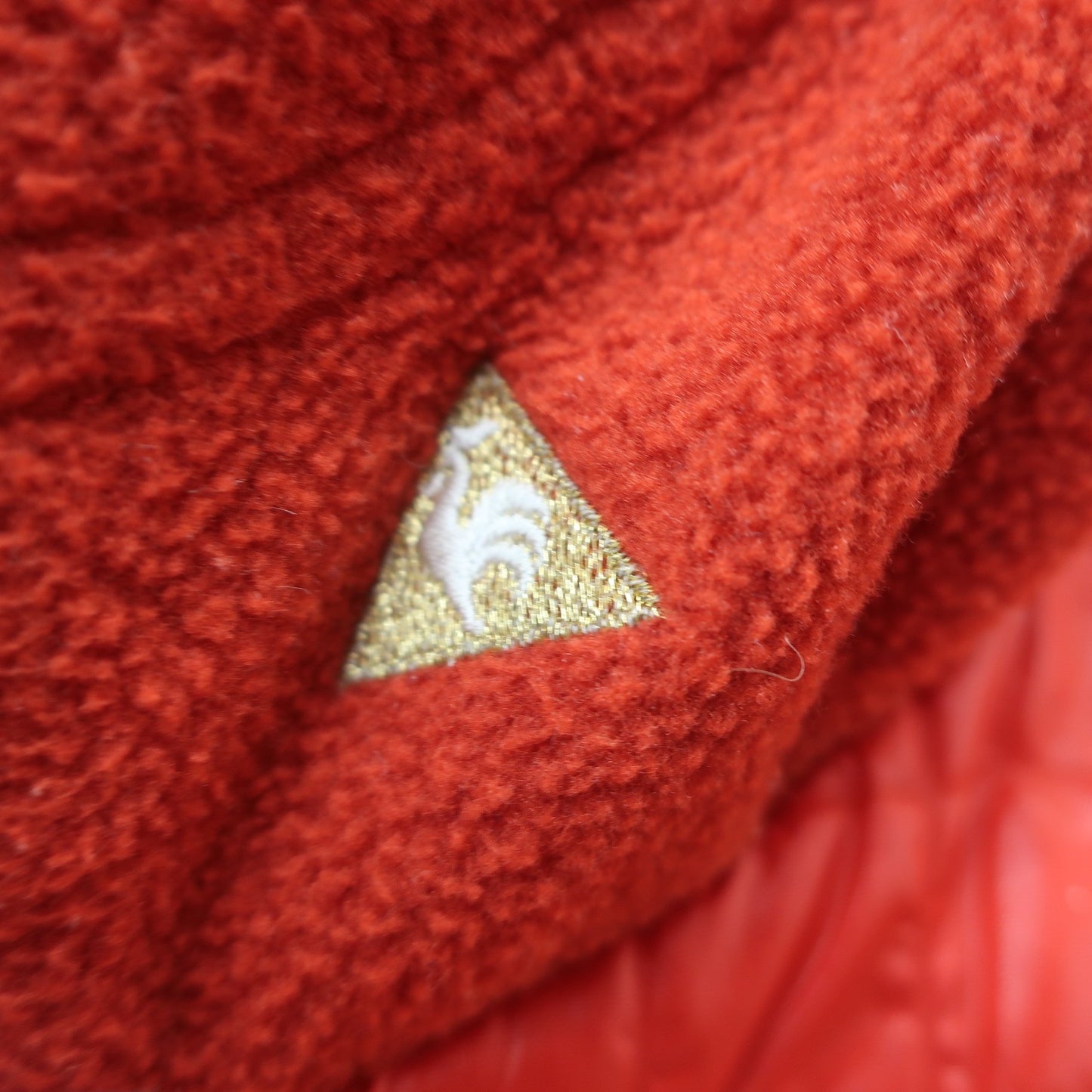 le coq sportif(ルコックスポルティフ) ナイロンパーカー 赤 レディース M B