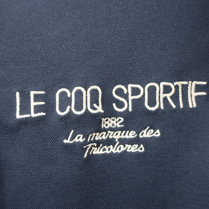le coq sportif(ルコックスポルティフ) 半袖ハーフジップシャツ ネイビー レディース S A