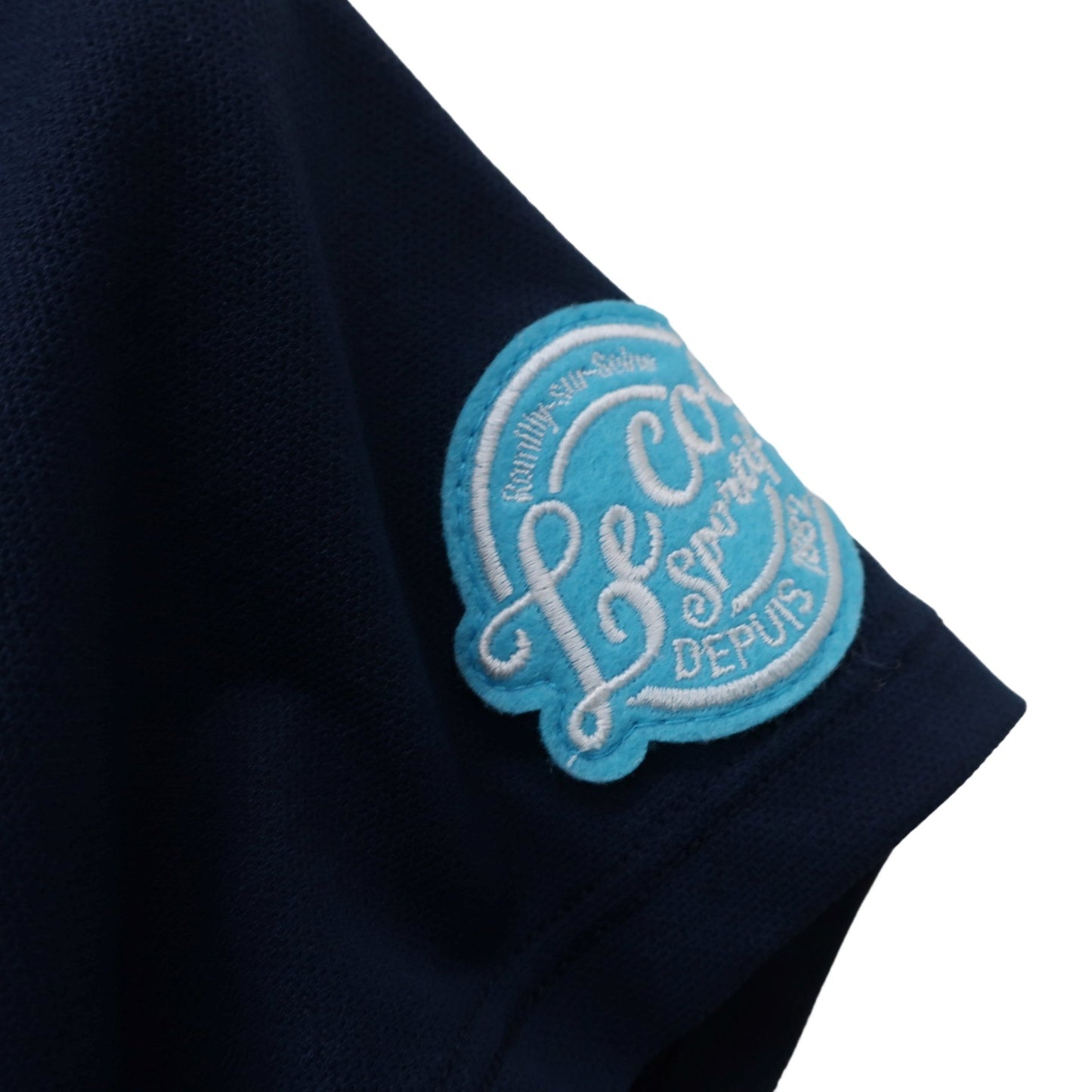 le coq sportif(ルコックスポルティフ) 半袖ハーフジップシャツ ネイビー レディース S A