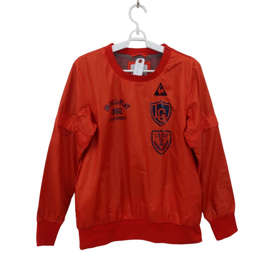 le coq sportif(ルコックスポルティフ) スニード オレンジ レディース L A
