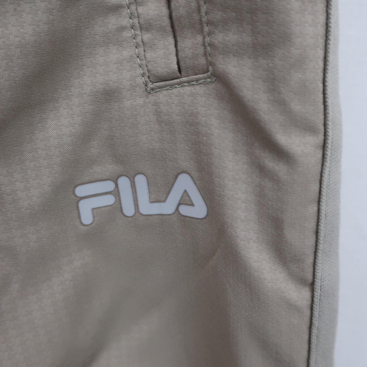 FILA GOLF1 ナイロンパンツ ベージュ メンズ S A
