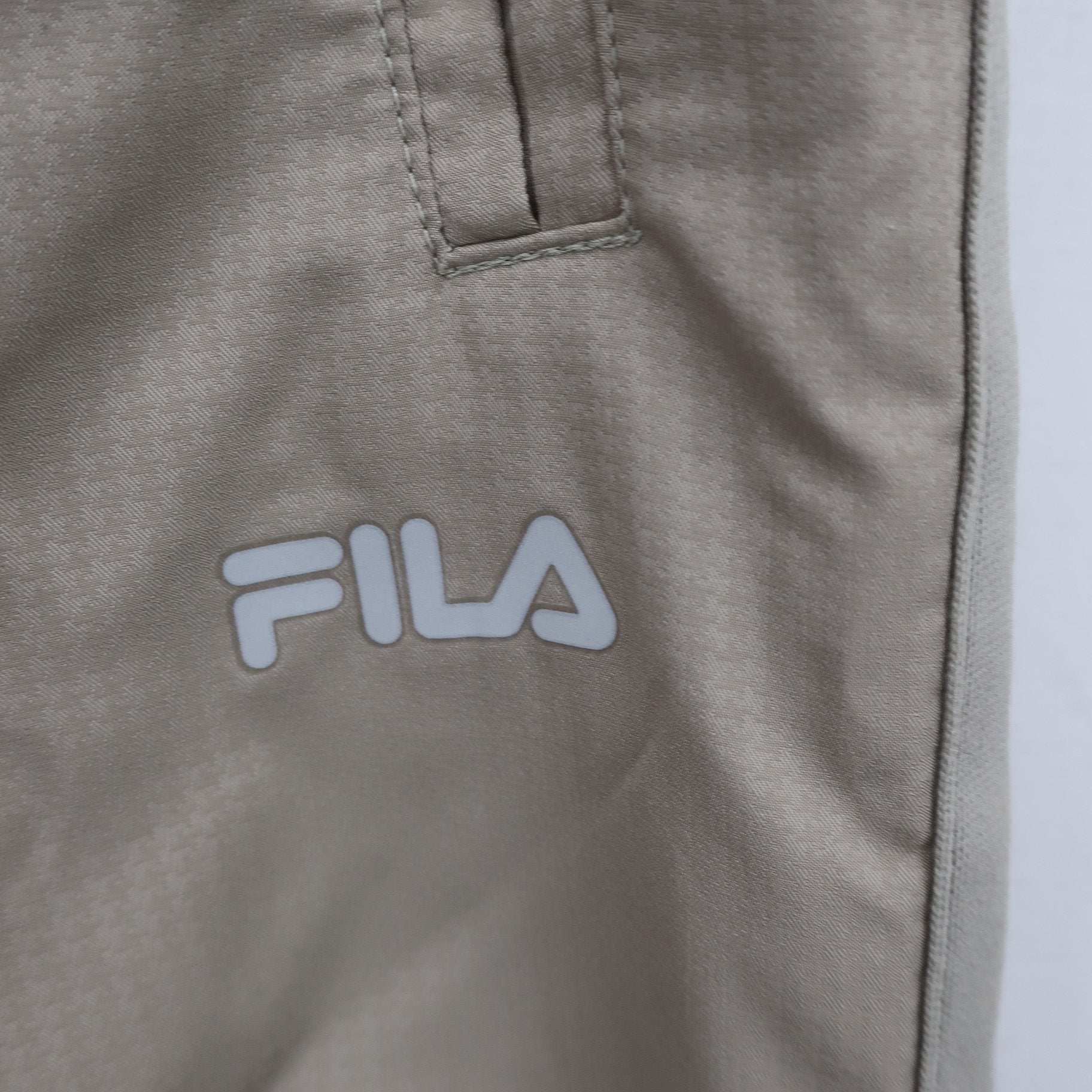 FILA GOLF1 ナイロンパンツ ベージュ メンズ S A