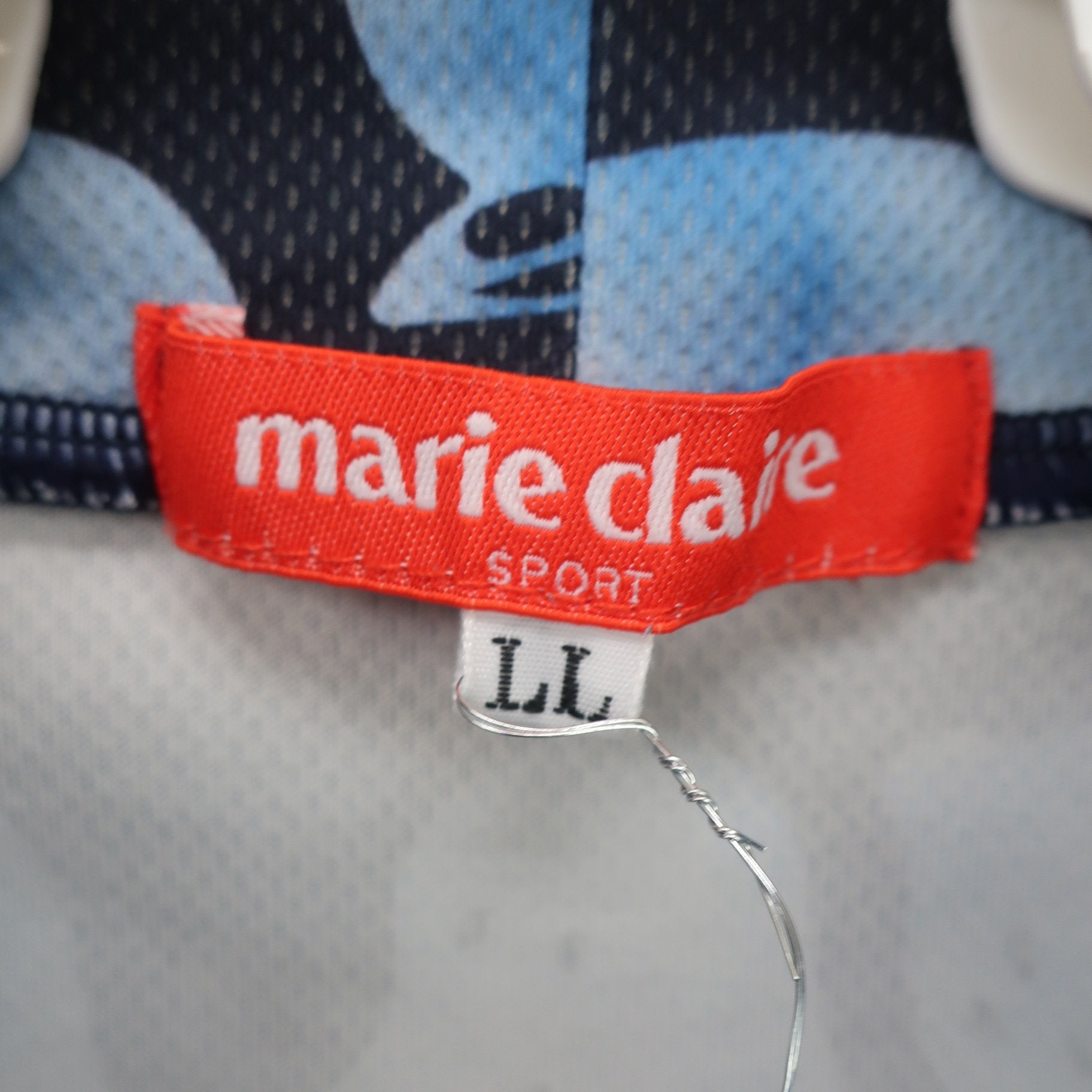 marie claire sport(マリ・クレール・スポーツ) 半袖モックネックシャツ 青系総柄 レディース LL A