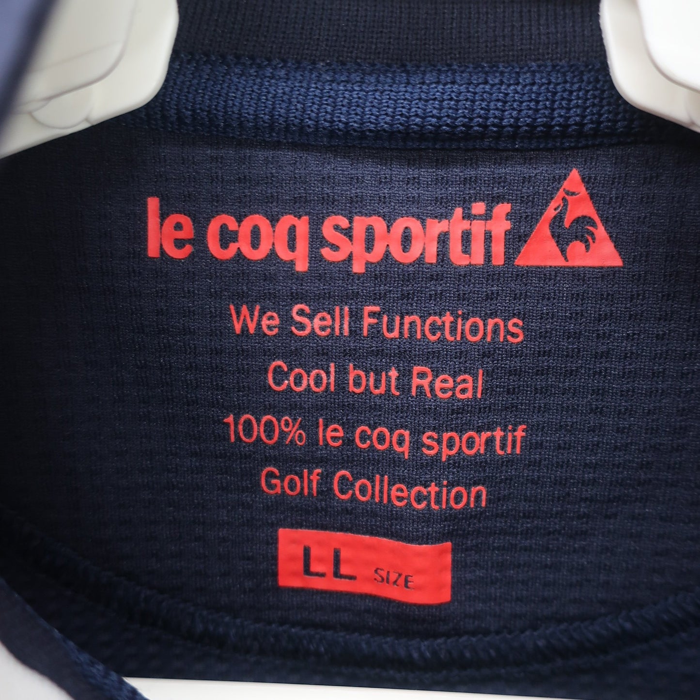 le coq sportif(ルコックスポルティフ) 半袖ハーフジップシャツ ネイビー レディース LL A