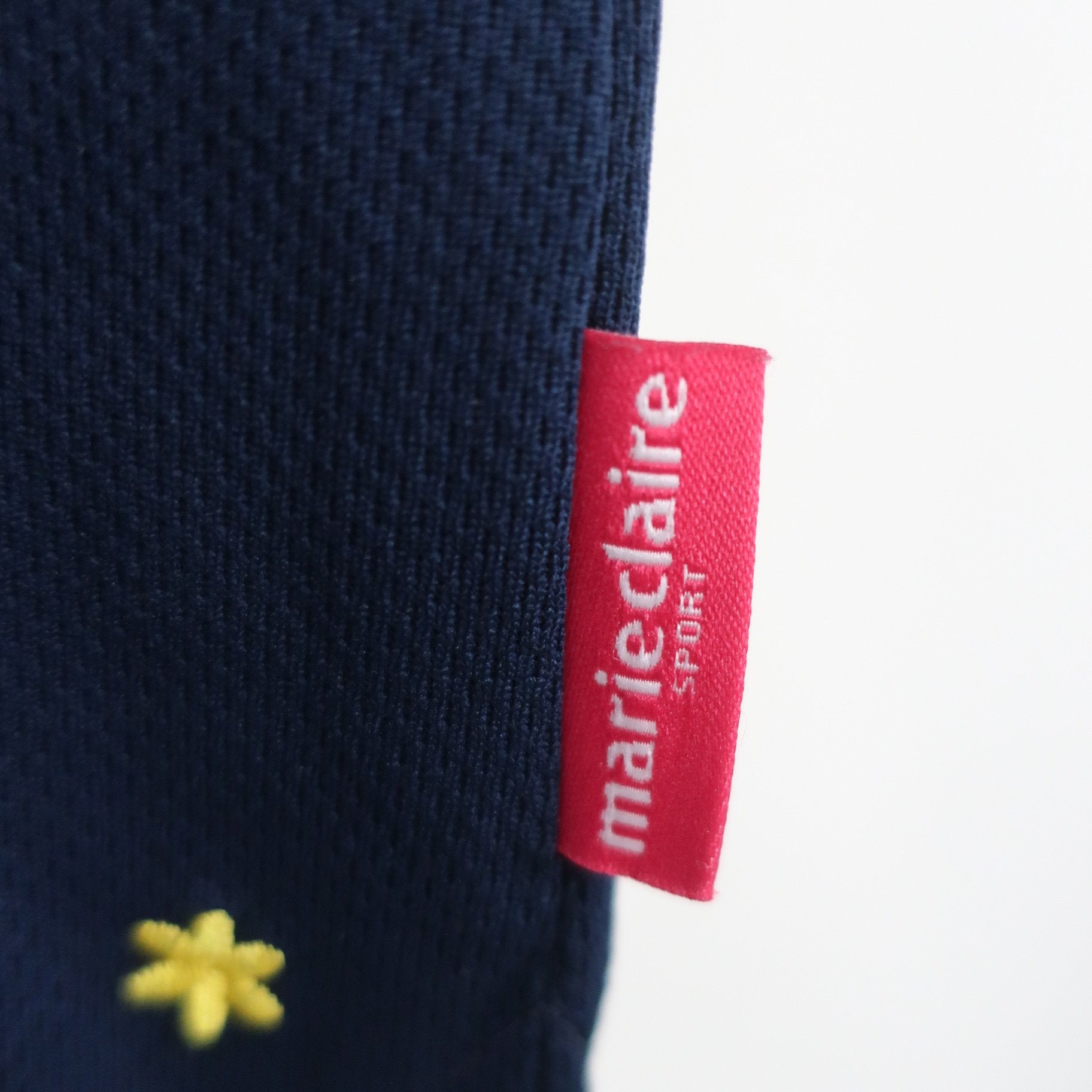 marie claire sport(マリ・クレール・スポーツ) 半袖モックネックシャツ ネイビー レディース L A