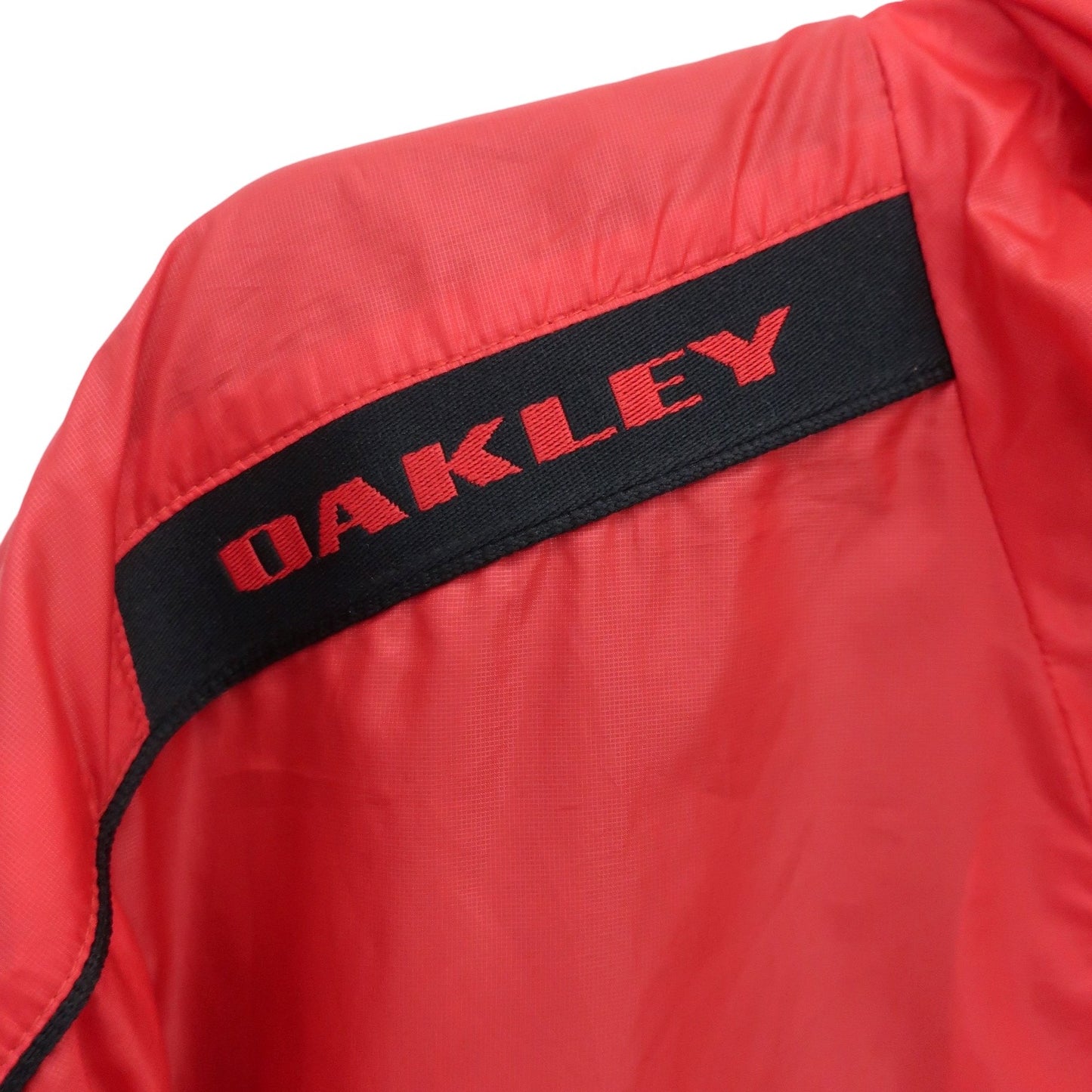 OAKLEY(オークリー) ナイロンパーカー 赤 メンズ L A