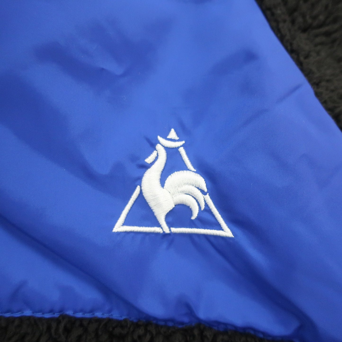 le coq sportif(ルコックスポルティフ) リバーシブルフルジップボアジャケット 青黒 メンズ M A
