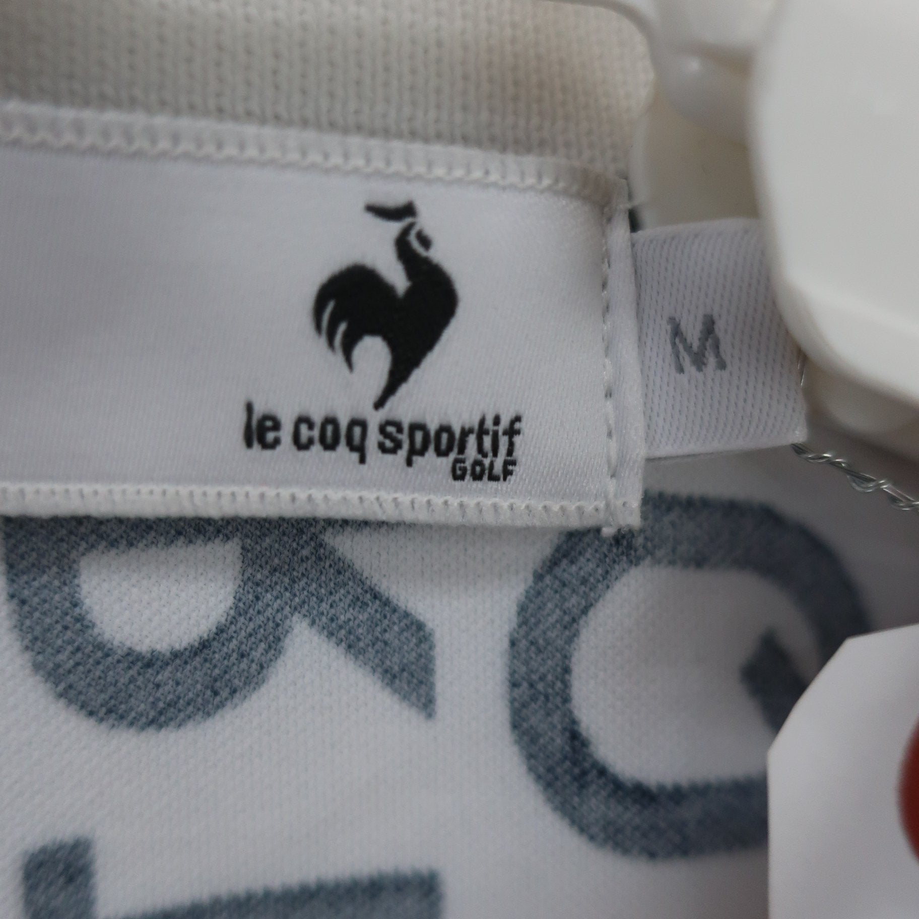 le coq sportif(ルコックスポルティフ) ポロシャツ 白 レディース M A