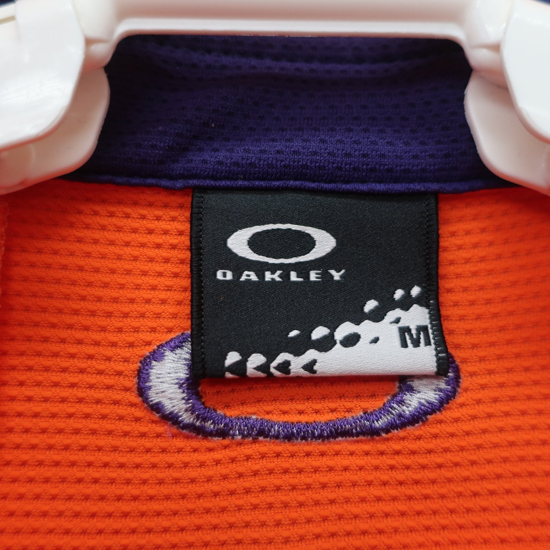 OAKLEY(オークリー) ポロシャツ オレンジ メンズ M A