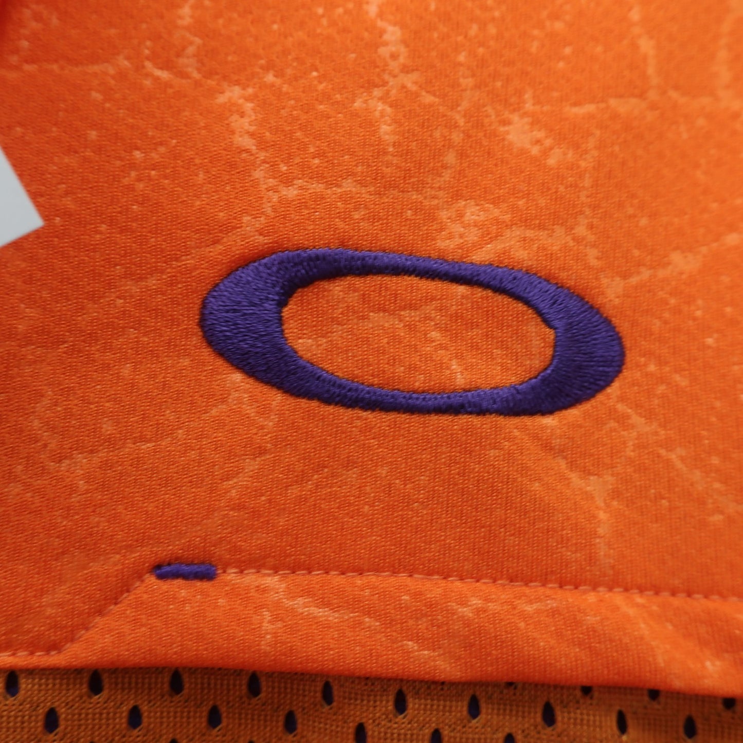 OAKLEY(オークリー) ポロシャツ オレンジ メンズ M A