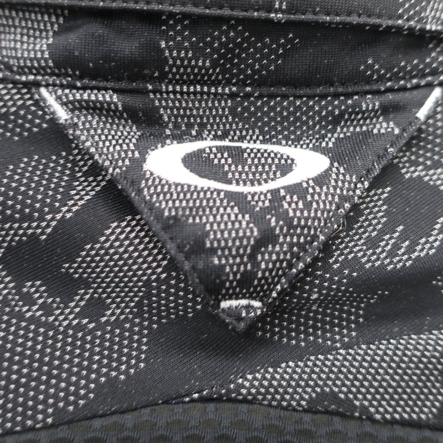 OAKLEY(オークリー) ポロシャツ 黒総柄 メンズ M A