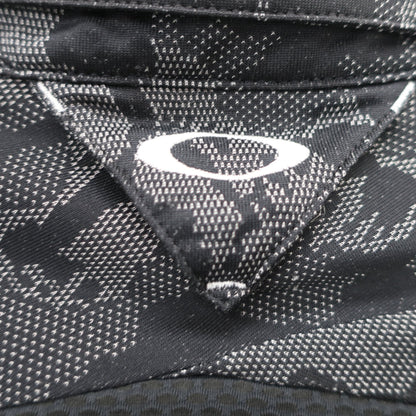 OAKLEY(オークリー) ポロシャツ 黒総柄 メンズ M A