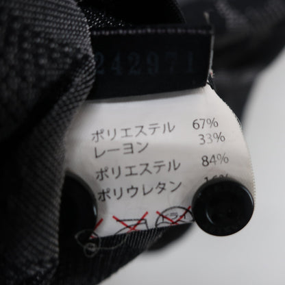 OAKLEY(オークリー) ポロシャツ 黒総柄 メンズ M A