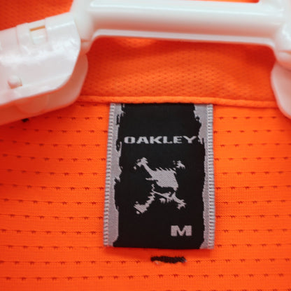OAKLEY(オークリー) ポロシャツ オレンジ メンズ M A