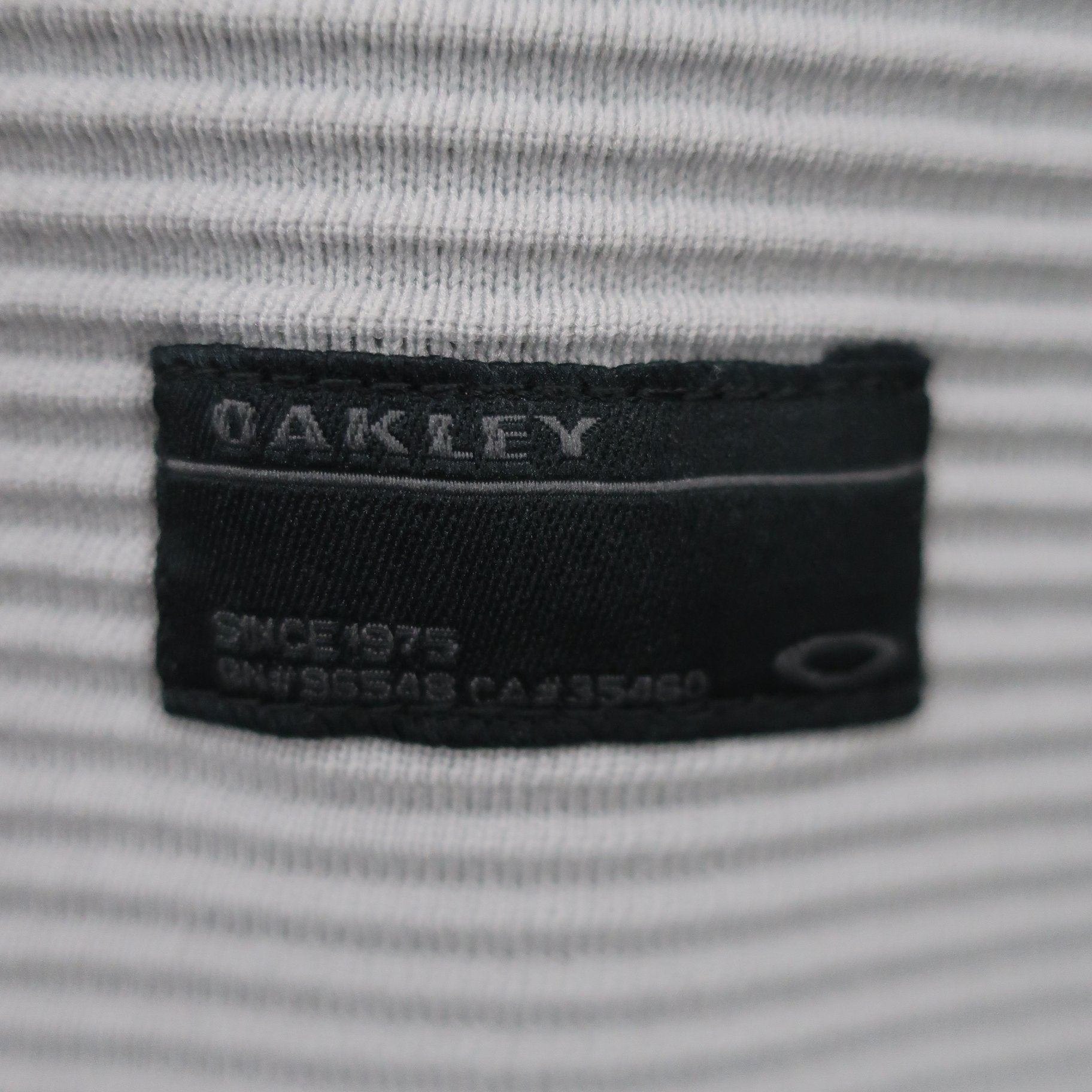 OAKLEY(オークリー) ハイネックトレーナー グレー白 メンズ M A