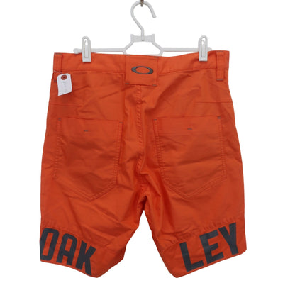 OAKLEY1 ハーフパンツ オレンジ メンズ 32 A