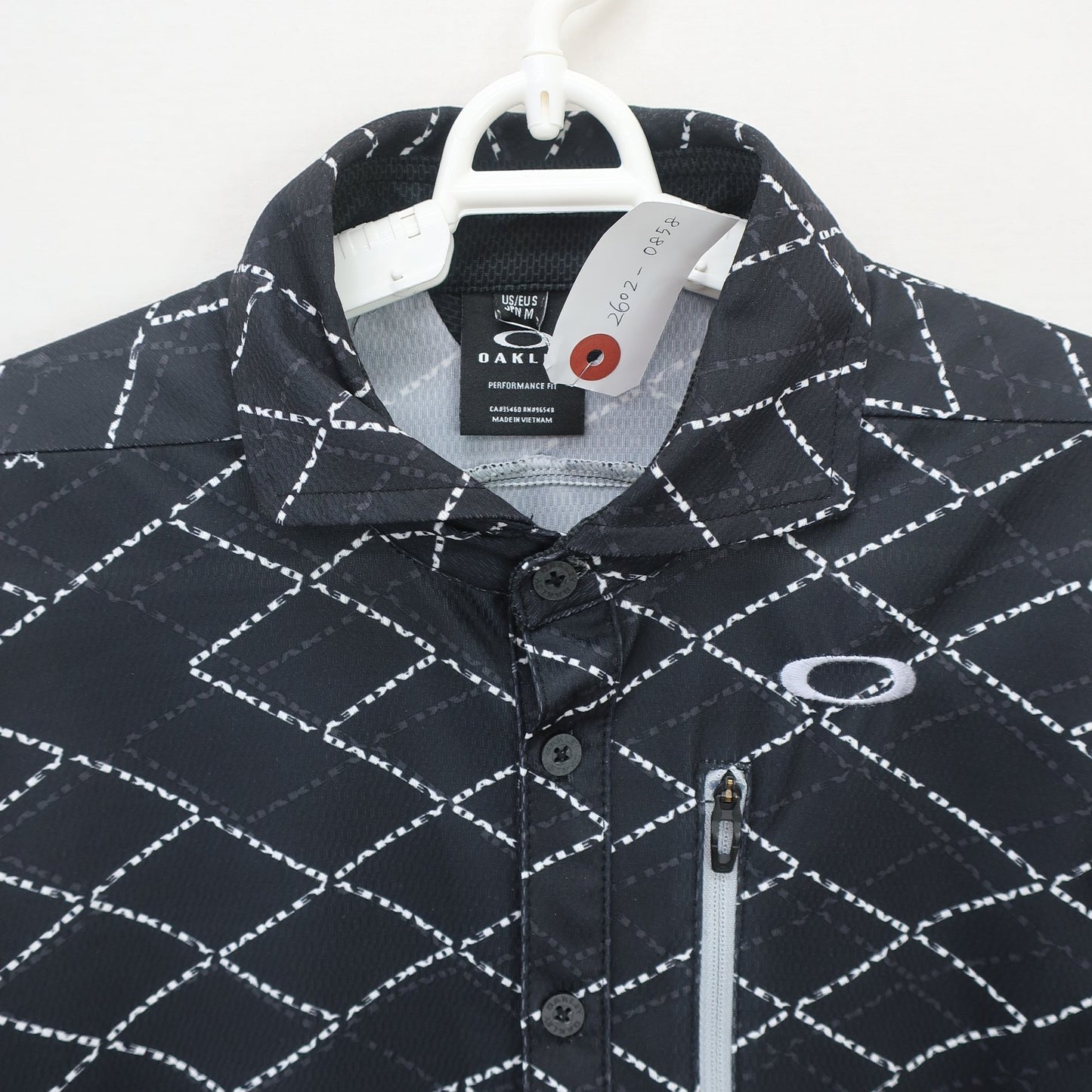 OAKLEY(オークリー) ポロシャツ 黒総柄 メンズ M A