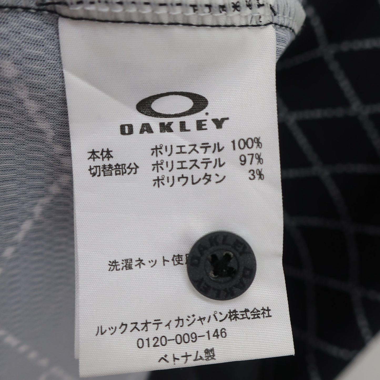 OAKLEY(オークリー) ポロシャツ 黒総柄 メンズ M A