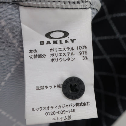 OAKLEY(オークリー) ポロシャツ 黒総柄 メンズ M A
