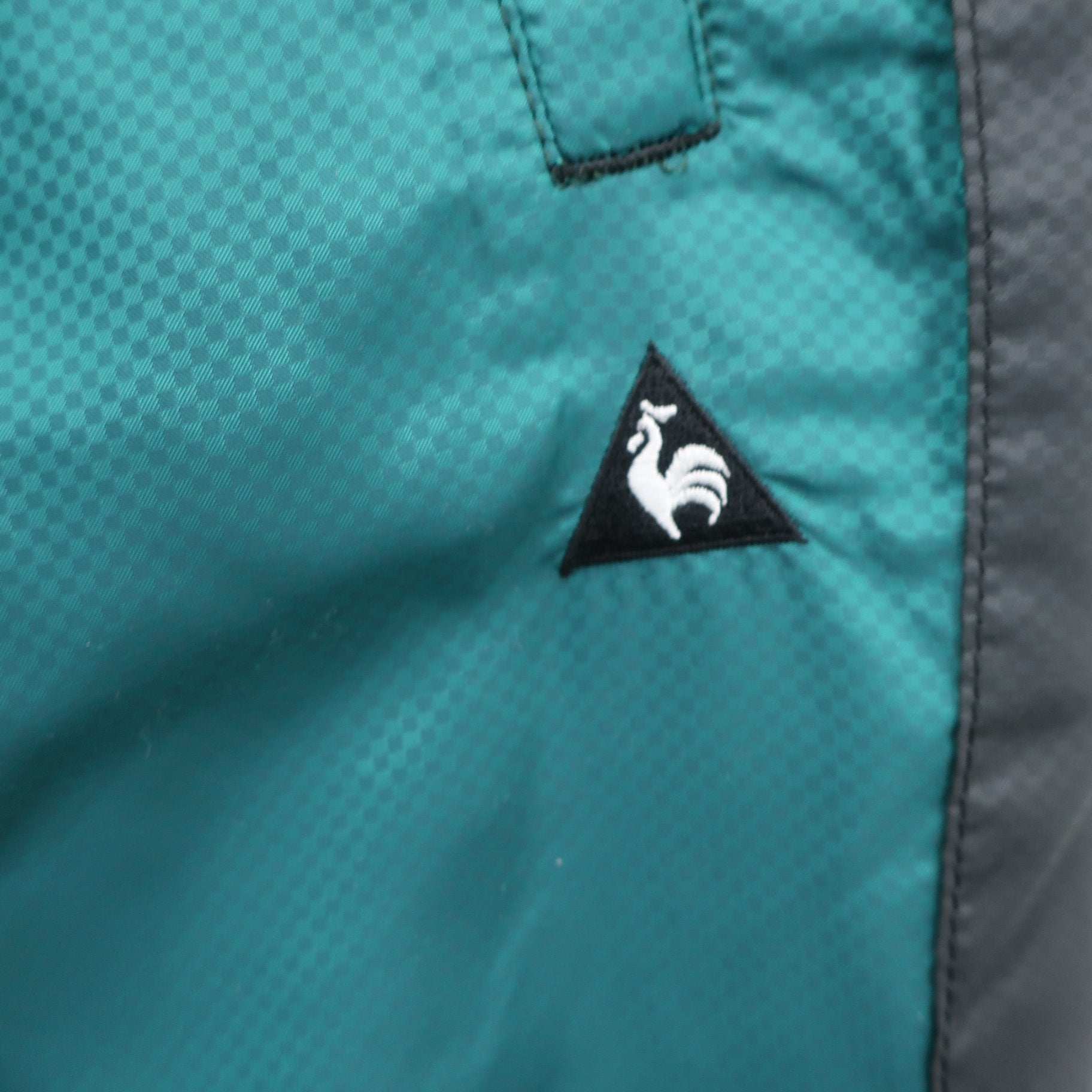 le coq sportif1 ナイロンパンツ 緑 メンズ LL A